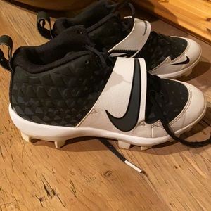 Nike football or baseball cleats black and white